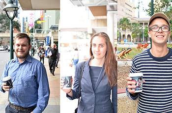 three young people holding batman v superman advertisied coffee cups