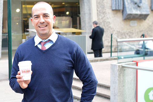 corporate professional holding griffith city council advertised coffee cup